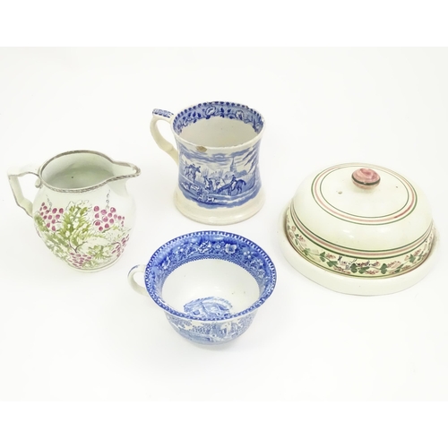 142 - Four Victorian and later ceramics to include a jug with fruiting vine detail, blue and white tankard... 