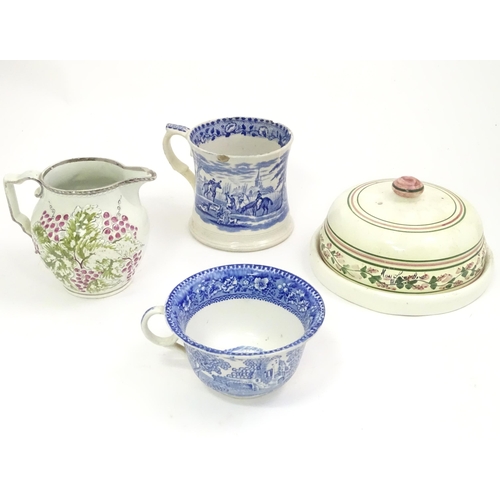 142 - Four Victorian and later ceramics to include a jug with fruiting vine detail, blue and white tankard... 