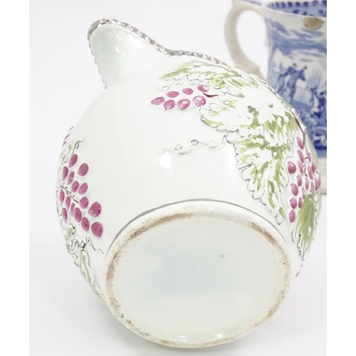 142 - Four Victorian and later ceramics to include a jug with fruiting vine detail, blue and white tankard... 