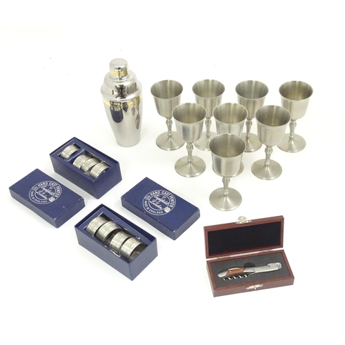 160 - Assorted items to include 8 Crown and Rose pewter goblets, 8 pewter napkin rings, a cocktail shaker ... 