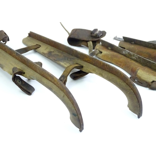 161 - Two pairs of vintage wooden ice skates