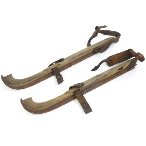 161 - Two pairs of vintage wooden ice skates