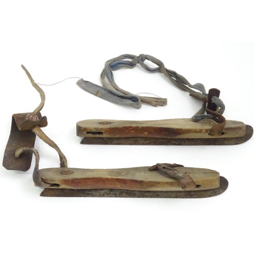 161 - Two pairs of vintage wooden ice skates