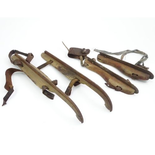 161 - Two pairs of vintage wooden ice skates