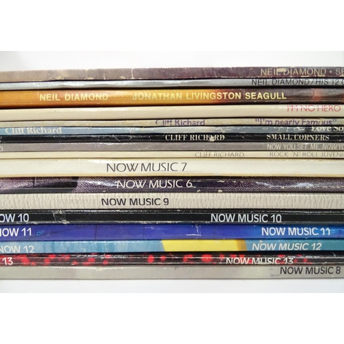 164 - A quantity of vinyl LPs / 33rpm records , to include artists Paul Simon, Neil Diamond, John Denver, ... 