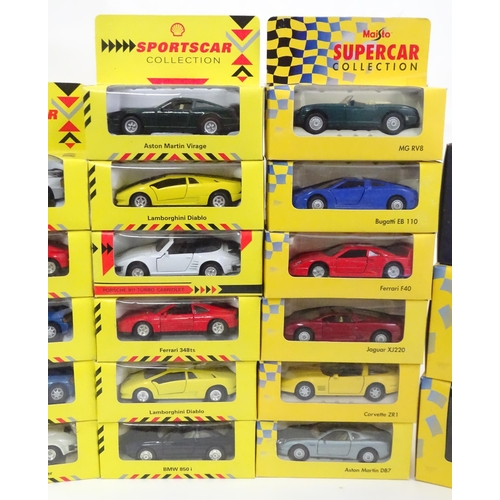 185 - Toys: A quantity of scale model die cast cars / vehicles to include examples by Shell Classic Sports... 