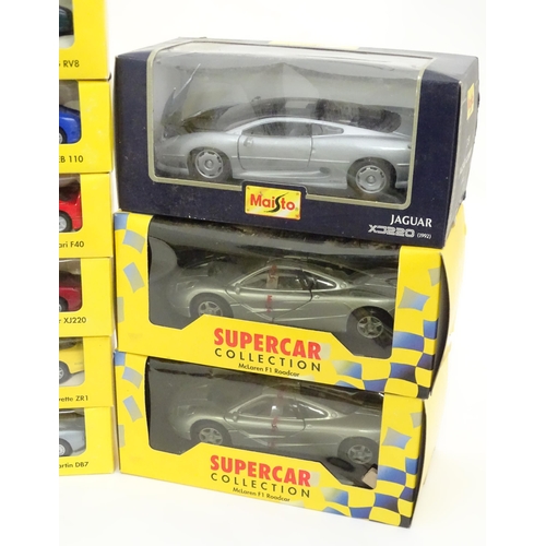 185 - Toys: A quantity of scale model die cast cars / vehicles to include examples by Shell Classic Sports... 