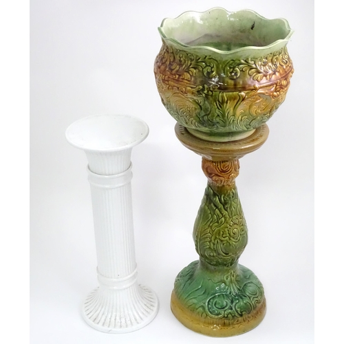 2 - A majolica jardiniere stand and planter with foliate decoration, signed England. Together with a jar... 