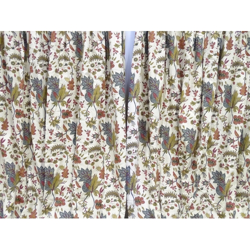 234 - Two pairs of curtains with a cream ground decorated with flowers and foliage. Together with two pelm... 