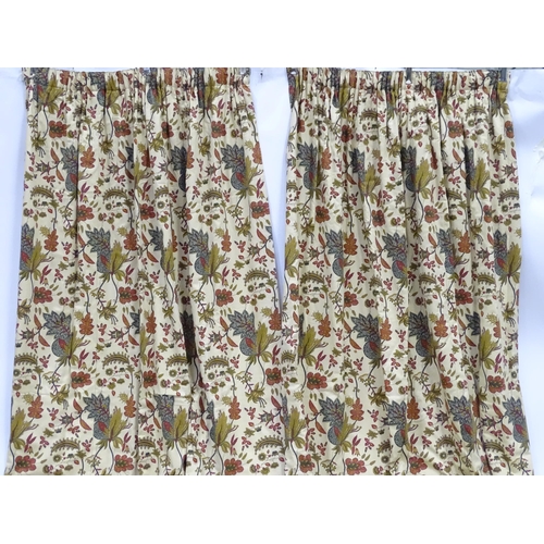 234 - Two pairs of curtains with a cream ground decorated with flowers and foliage. Together with two pelm... 