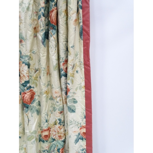 237 - A pair of curtains with a cream ground and rose decoration. Together with another pair of curtains w... 