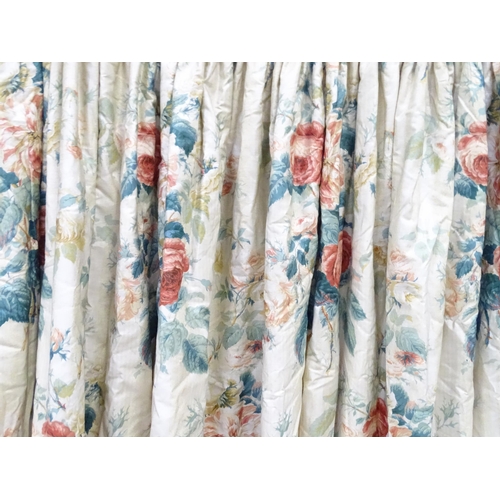 237 - A pair of curtains with a cream ground and rose decoration. Together with another pair of curtains w... 