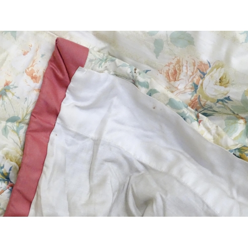 237 - A pair of curtains with a cream ground and rose decoration. Together with another pair of curtains w... 