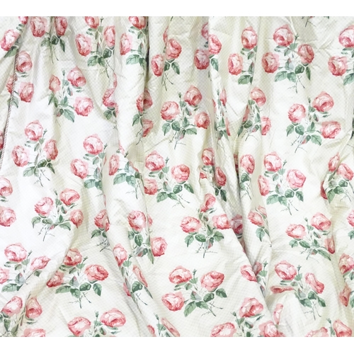 237 - A pair of curtains with a cream ground and rose decoration. Together with another pair of curtains w... 