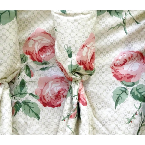 237 - A pair of curtains with a cream ground and rose decoration. Together with another pair of curtains w... 