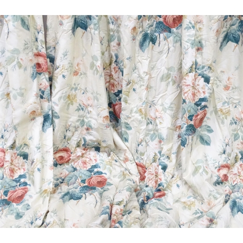 237 - A pair of curtains with a cream ground and rose decoration. Together with another pair of curtains w... 