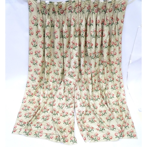 237 - A pair of curtains with a cream ground and rose decoration. Together with another pair of curtains w... 