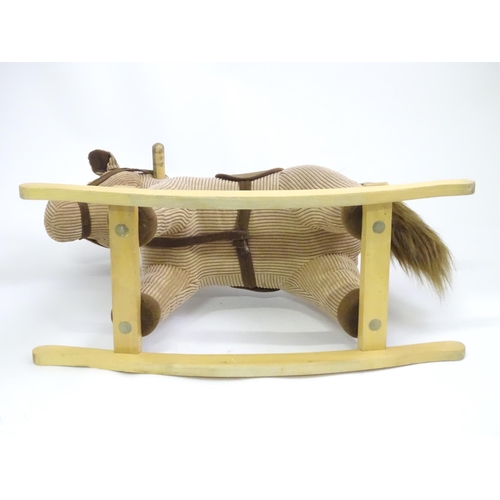 405 - A Chad Valley toddler's rocking horse / rocker. Approx. 28