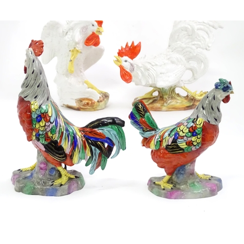 406 - A quantity of ceramic models of cockerels / chickens. Largest approx. 12