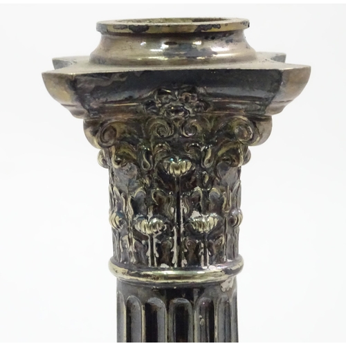 447 - A silver plate lamp base of Corinthian column form. Approx 13 1/4