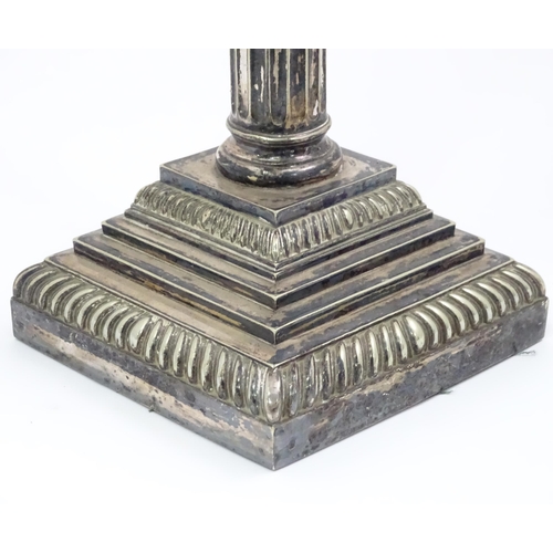 447 - A silver plate lamp base of Corinthian column form. Approx 13 1/4