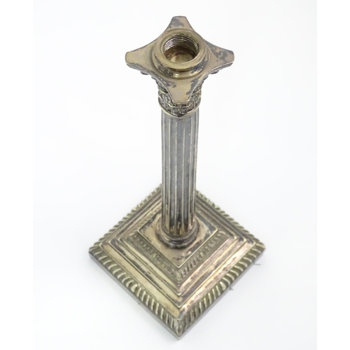 447 - A silver plate lamp base of Corinthian column form. Approx 13 1/4