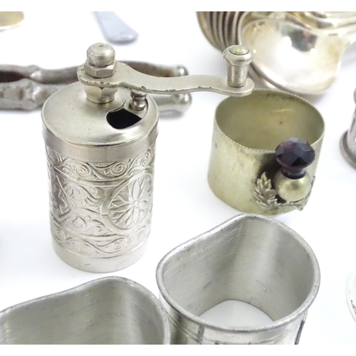 470 - A quantity of assorted silver plated wares to include toast rack, tankard, flatware, napkin rings et... 