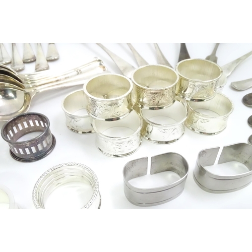 470 - A quantity of assorted silver plated wares to include toast rack, tankard, flatware, napkin rings et... 