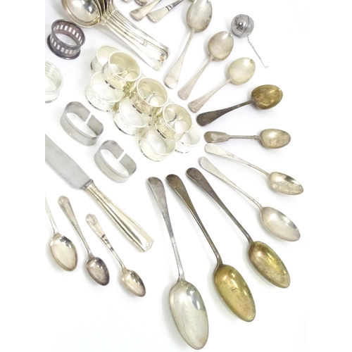 470 - A quantity of assorted silver plated wares to include toast rack, tankard, flatware, napkin rings et... 