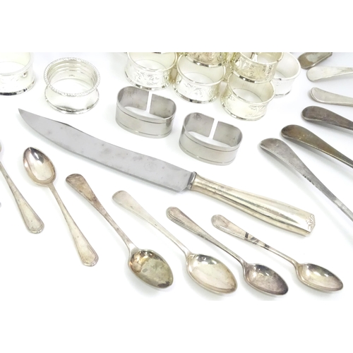 470 - A quantity of assorted silver plated wares to include toast rack, tankard, flatware, napkin rings et... 