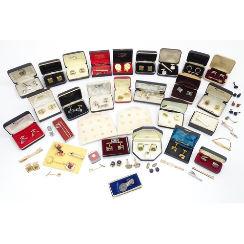 574 - A large quantity of assorted cufflinks and tie pins, to include examples by Stratton, Swank, Saville... 