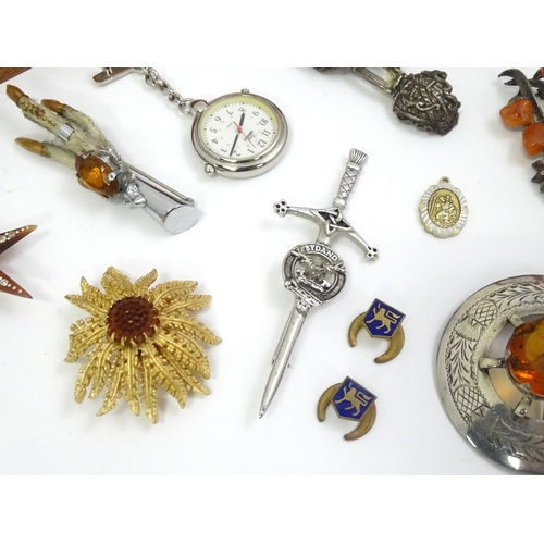 575 - A quantity of assorted costume jewellery to include brooches, necklaces etc to include examples by M... 