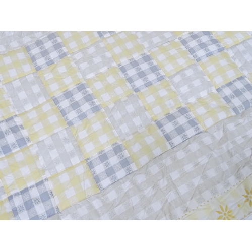 596 - A pair of curtains decorated in a yellow and white check pattern with bow detail. Together with a ma... 