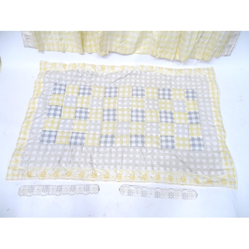 596 - A pair of curtains decorated in a yellow and white check pattern with bow detail. Together with a ma... 