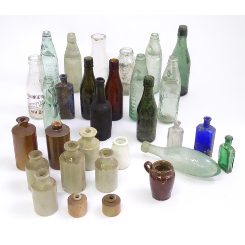 641 - A quantity of assorted glass and stoneware bottles to include codd bottles, beer bottles, milk bottl... 