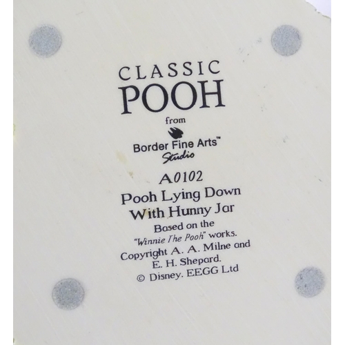 670 - A quantity of Winnie the Pooh figures / models to include examples by Border Fine Arts, Disney, etc.... 