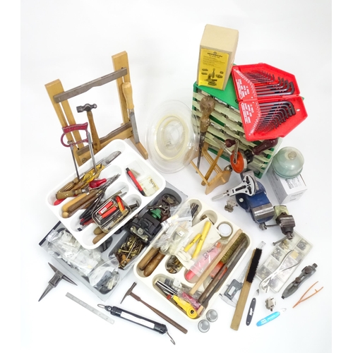 712 - Clock / Watchmakers / Repairers Interest : A quantity of clock repairing tools & equipment, to inclu... 