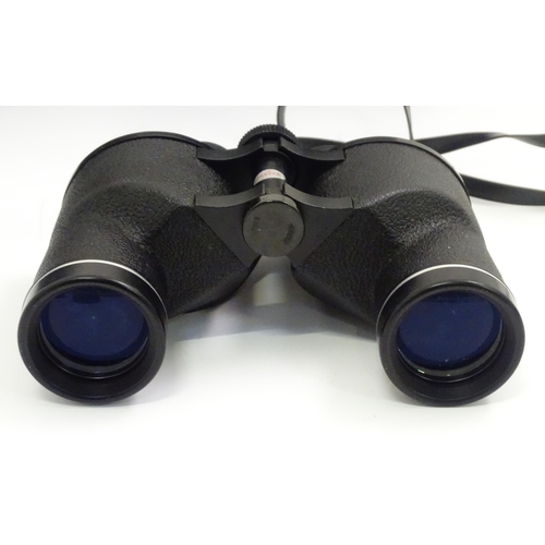 722 - Two cased pairs of binoculars, comprising PentaVision 10x50WA and Asahi Pentax 566 8x40WA (2)