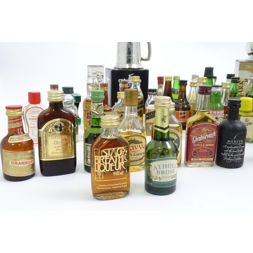 739 - A quantity of alcohol miniatures, to include Scotch whiskies and Guinness, together with two pewter ... 