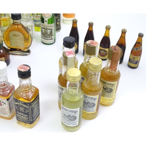 739 - A quantity of alcohol miniatures, to include Scotch whiskies and Guinness, together with two pewter ... 