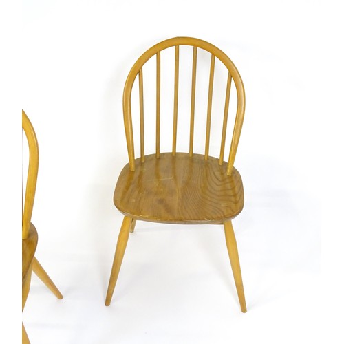 253 - Three elm and beech stick back Windsor chairs in the manner of Ercol. 17