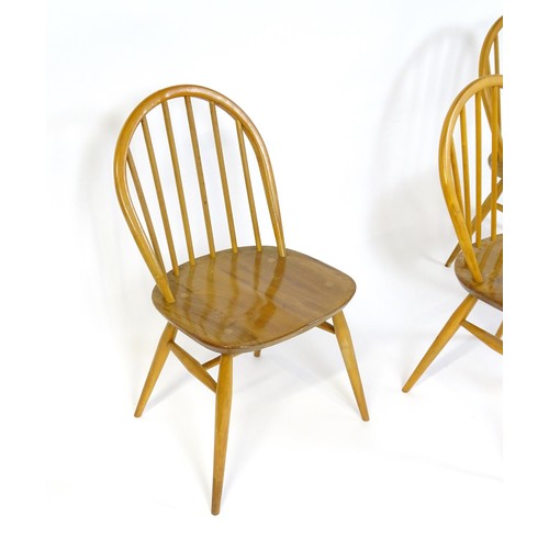 253 - Three elm and beech stick back Windsor chairs in the manner of Ercol. 17