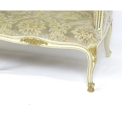 254 - A 20thC Louis XV style sofa with carved flower and shell decoration raised on five cabriole legs. 61... 