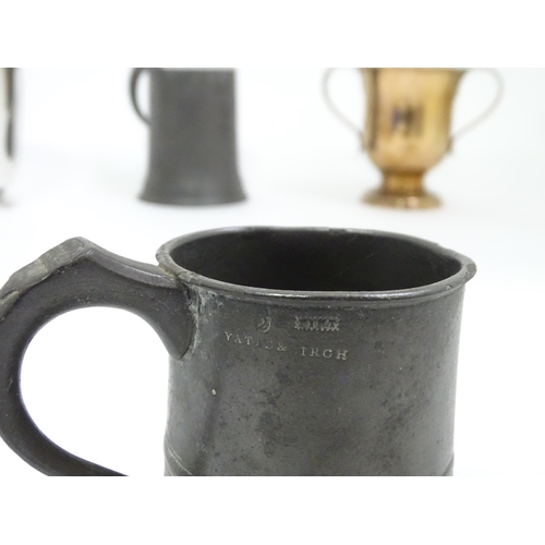 449 - A quantity of metalware, comprising pewter and brass tankards, a heavy horse terrett and miners lamp... 