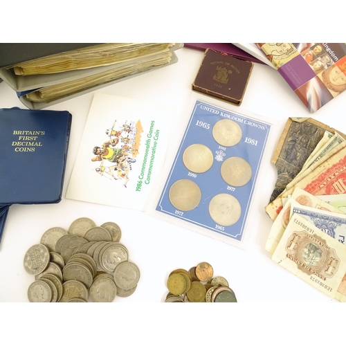 601 - Coins : a quantity of coinage and banknotes, to include five decimal sets, a cased 1965-1981 crown s... 