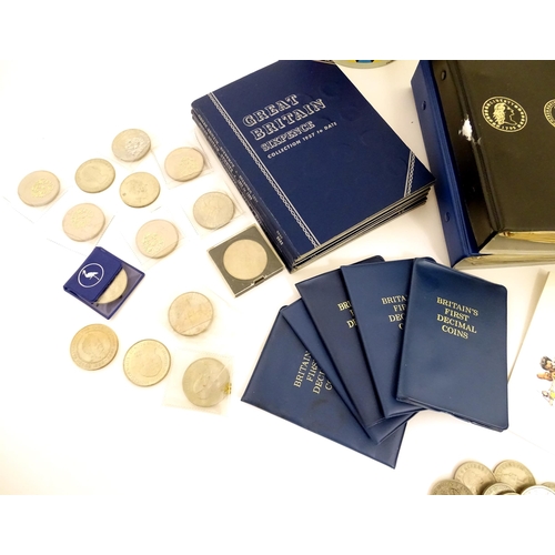 601 - Coins : a quantity of coinage and banknotes, to include five decimal sets, a cased 1965-1981 crown s... 