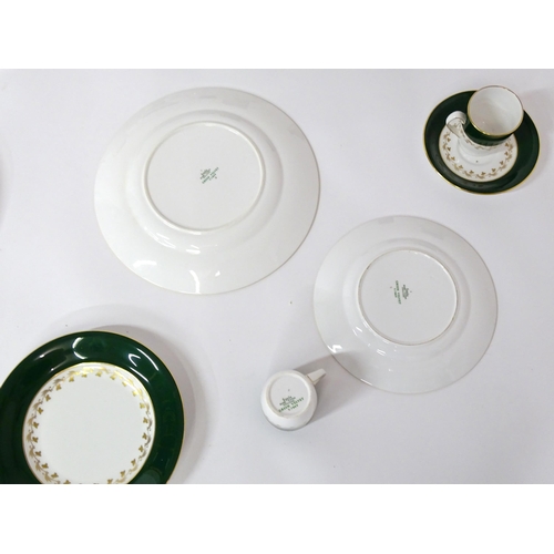 710 - A quantity of Spode dinner wares in the Green Velvet pattern to include plates, gravy boat, milk jug... 