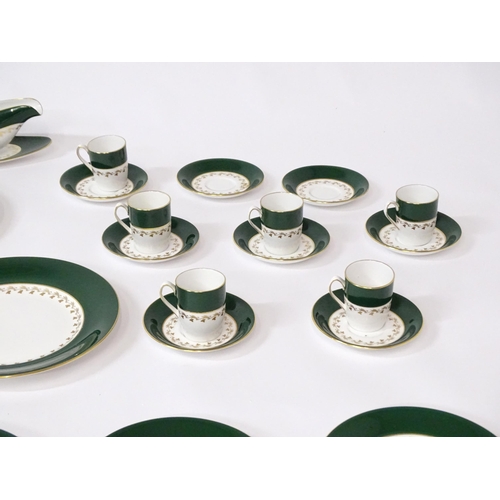 710 - A quantity of Spode dinner wares in the Green Velvet pattern to include plates, gravy boat, milk jug... 