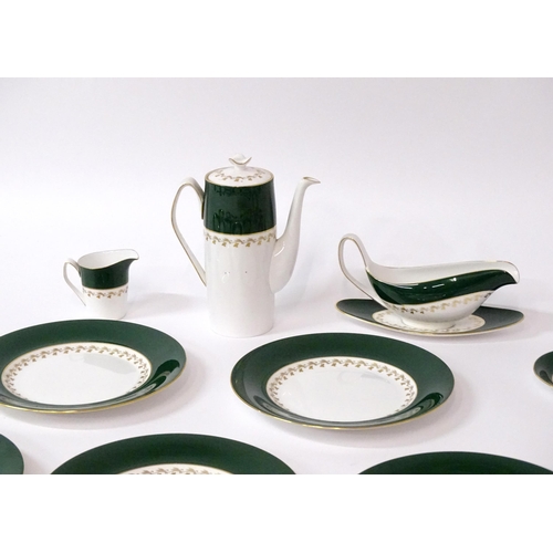 710 - A quantity of Spode dinner wares in the Green Velvet pattern to include plates, gravy boat, milk jug... 