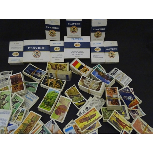 830 - A quantity of cigarette and tea cards to include examples from Brooke Bond series Adventurers & Expl... 